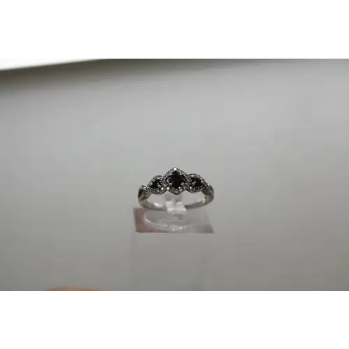 10k W.G. .39ctw BLACK & .22ctw WHITE DIAMOND BRAIDED band ring