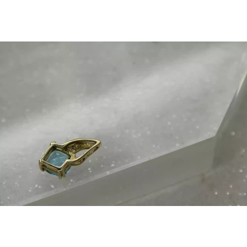 10k Yellow Gold BLUE TOPAZ w/ accent DIAMOND FANCY DESIGN pendant
