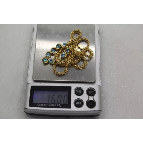 1/30 14k/ .925 Sterling Silver BLUE TOPAZ 