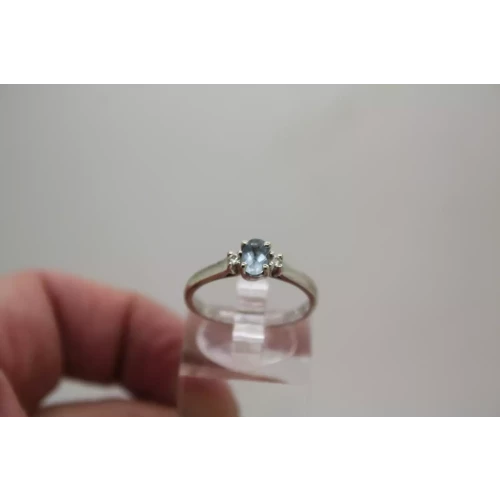 14k W.G. AQUAMARINE & DIAMOND SOLITAIRE w/ acc. ring size 7.25