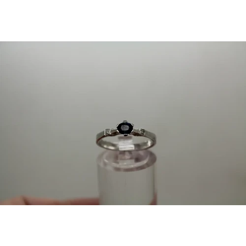 14k W.G. BLUE SAPPHIRE SOLITAIRE with DIAMOND acc. ring size 6.75