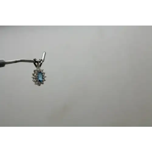 14k W.G. Oval Cut BLUE TOPAZ & WHITE SAPPHIRE HALO pendant