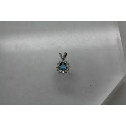 14k W.G. Oval Cut BLUE TOPAZ & WHITE SAPPHIRE HALO pendant