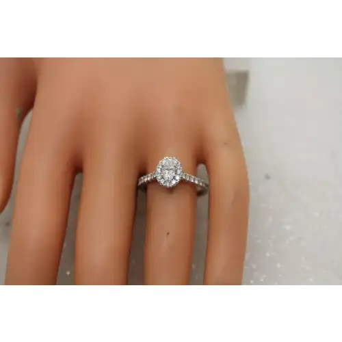 14k W.G. Oval Cut MOISSANITE HALO with SIDE STONES ring size 8.5