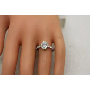 14k W.G. Oval Cut MOISSANITE HALO with SIDE STONES ring size 8.5