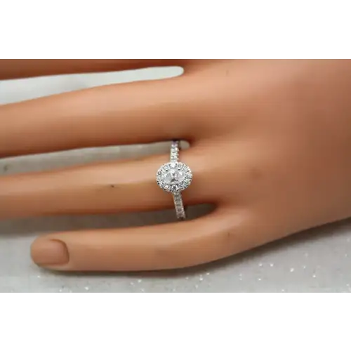 14k W.G. Oval Cut MOISSANITE HALO with SIDE STONES ring size 8.5