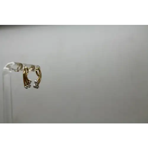 14k Y.G. .06ctw DIAMOND SWIRL DESIGN earrings