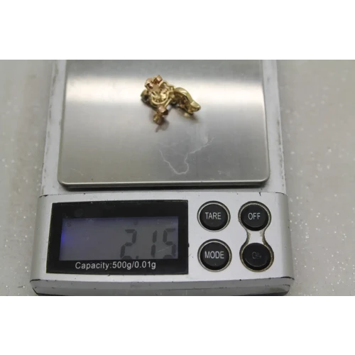 14k Y.G. .25ctw DIAMOND FANCY WAVE DESIGN earrings