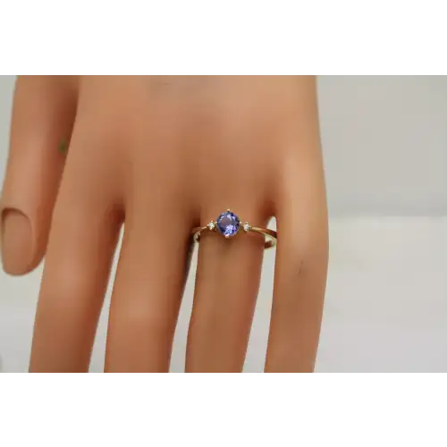 14k Y.G. .50ct TANZANITE SOLITAIRE w/ Diamond Acc. ring size 9.75
