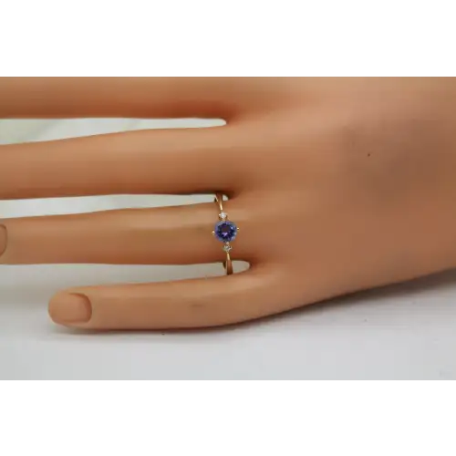 14k Y.G. .50ct TANZANITE SOLITAIRE w/ Diamond Acc. ring size 9.75