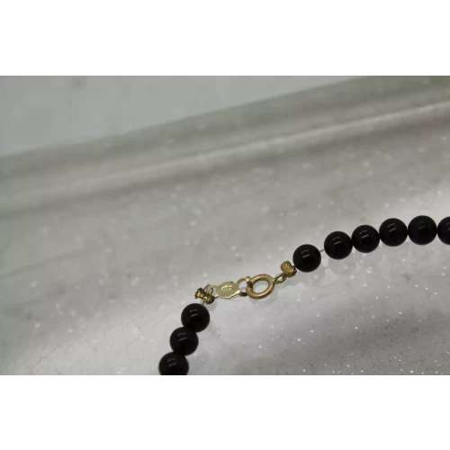 14k Y.G. BLACK ONYX & FRESHWATER RICE PEARL BEADED bracelet 7 1/2