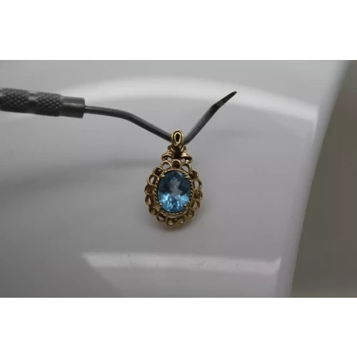 14k Y.G. Oval Cut BLUE TOPAZ FILIGREE pendant