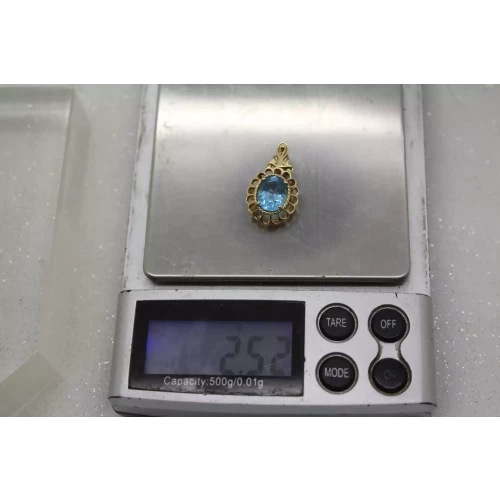 14k Y.G. Oval Cut BLUE TOPAZ FILIGREE pendant
