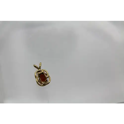 14k Y.G. Oval Cut GARNET KNOT DESIGN pendant #