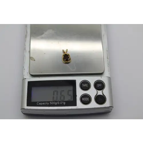 14k Y.G. Oval Cut GARNET KNOT DESIGN pendant #