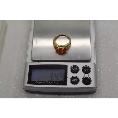 14k Y.G. Oval Cut ORANGE CZ 3 STONE ring size 6