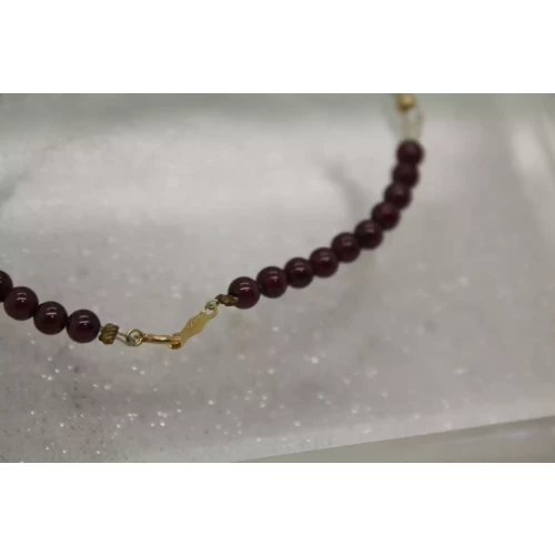 14k Y.G. PURPLE GEMSTONE & FRESHWATER RICE PEARL BRACELET 7