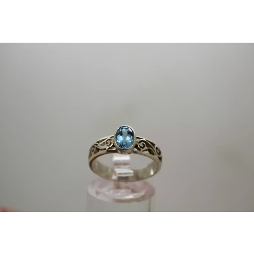 .925 S.S. BLUE TOPAZ OPEN SCROLL WORK DESIGN ring size 7.75