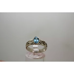 .925 S.S. BLUE TOPAZ OPEN SCROLL WORK DESIGN ring size 7.75