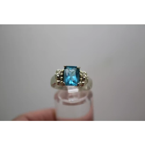 .925 S.S. Emerald Cut VIVID BLUE STONE ring size 7.75