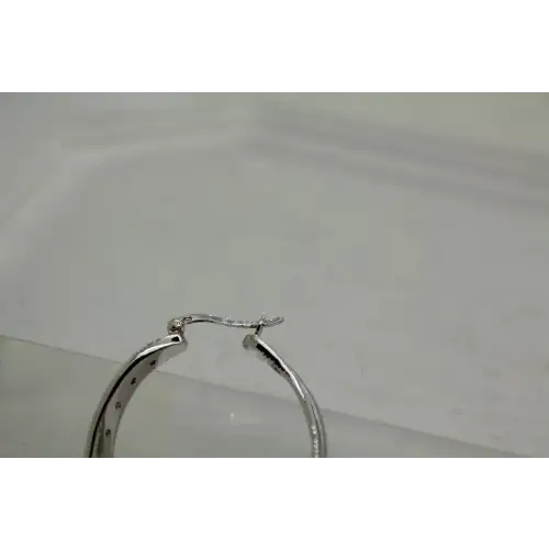 .925 S.S. INSIDE OUT CRYSTALS TWIST DESIGN hoop earrings