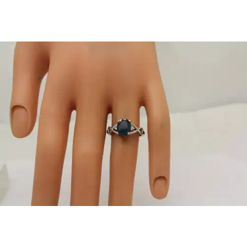.925 S.S. LONDON BLUE TOPAZ SOLITAIRE w/ acc. ring size 6.5