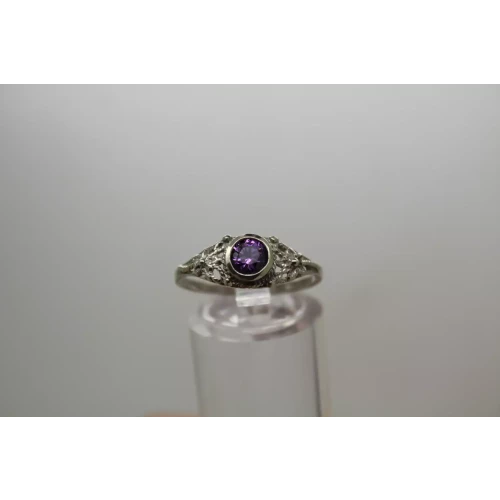 .925 S.S. PURPLE CZ FLORAL FILIGREE DESIGN ring size 7