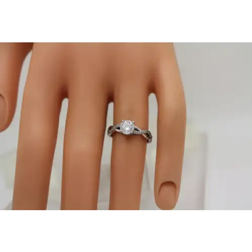 .925 S.S. Round Cut CLEAR CZ SOLITAIRE w/acc. BRAIDED ring size 5.5