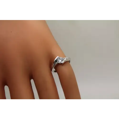 .925 S.S. Round CZ SOLITAIRE with accents CROSSOVER ring size 4.5