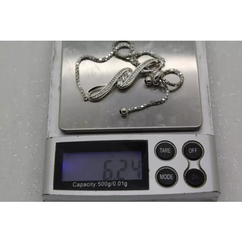 .925 S.S. WHITE SAPPHIRE & DIAMOND DOUBLE INFINITY BOLO 9