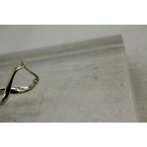 CHAMILIA .925 S.S. CZ INFINITY CHARM HOOP earrings