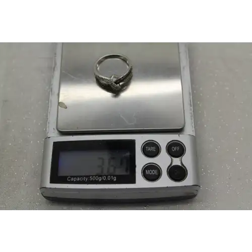 DAMAGED JWBR .925 .S.S GREEN & WHITE DIAMOND CROSSOVER ring size 6.75