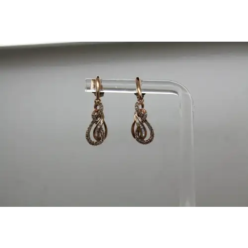 JWBR 14k R.G. .24ctw DIAMOND SWIRL INFINITY DANGLE earrings
