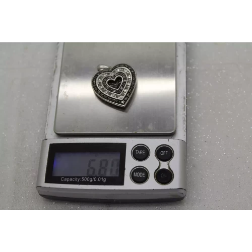 JWBR .925 S.S. BLACK & WHITE DIAMOND REVERSIBLE HEART pendant