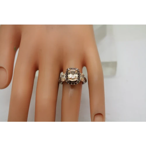 K* KEY STAR .925 S.S. PEACH STONE HALO with brown acc size 7 #