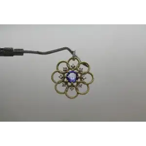 KALATI 14k Y.G. TANZANITE & DIAMOND OPENWORK FLOWER pend.
