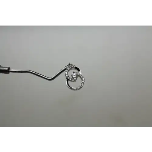 KAY JEWELERS 10k W.G. 1/3ctw DIAMOND ENCIRCLED by LOVE pendant