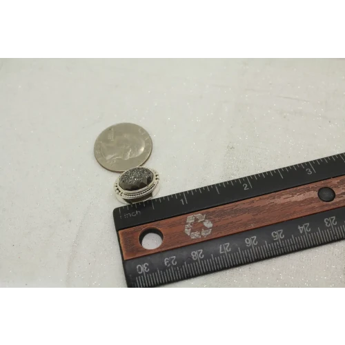 LORI BONN .925 S.S. PUTTING ON THE GLITZ HEMATITE OVAL SLIDE CHARM