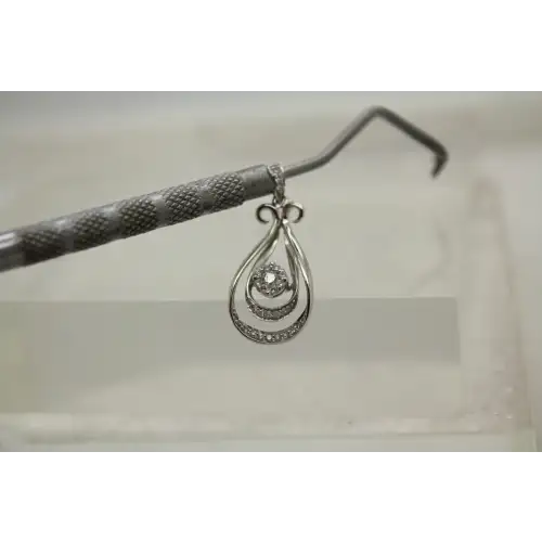 Signed 10k W.G. 1/5ctw DIAMOND DOUBLE FANCY TEARDROP pendant