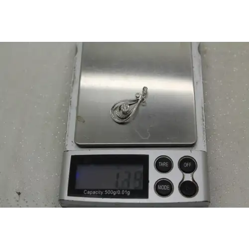 Signed 10k W.G. 1/5ctw DIAMOND DOUBLE FANCY TEARDROP pendant