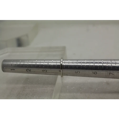 Signed 10k W.G. .20ctw DIAMOND WAVE DESIGN BAND ring size 4