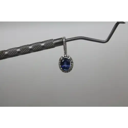 Signed 10k W.G. BLUE SAPPHIRE & .25ctw DIAMOND HALO pendant #