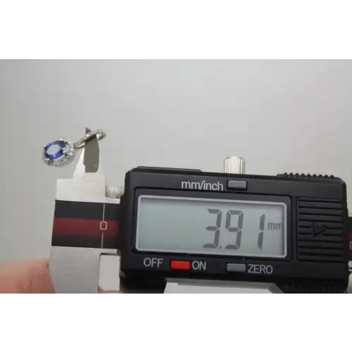 Signed 10k W.G. BLUE SAPPHIRE & .25ctw DIAMOND HALO pendant #