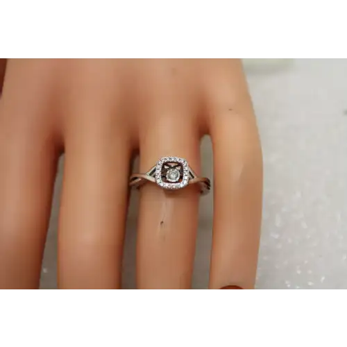 Signed 10k W.G. MOVING DIAMOND with DIAMOND HALO ring size 6.75