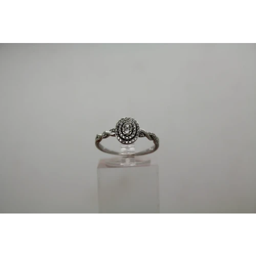 Signed 10k W.G. OVAL DIAMOND ILLUSION DOUBLE HALO ring size 7.75