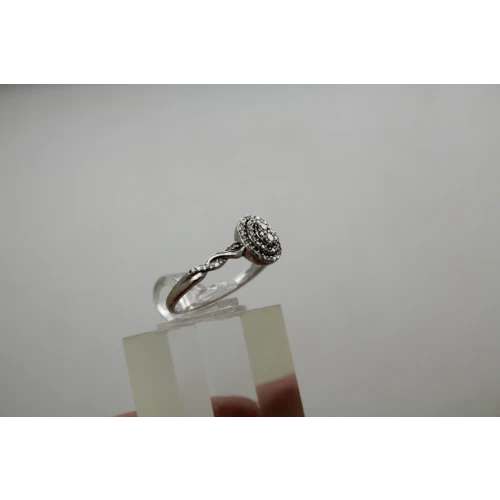 Signed 10k W.G. OVAL DIAMOND ILLUSION DOUBLE HALO ring size 7.75