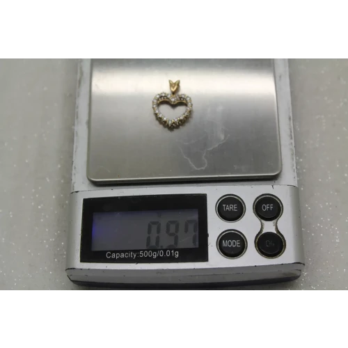 Signed 10k Y.G. .18ctw DIAMOND OPEN HEART DESIGN pendant