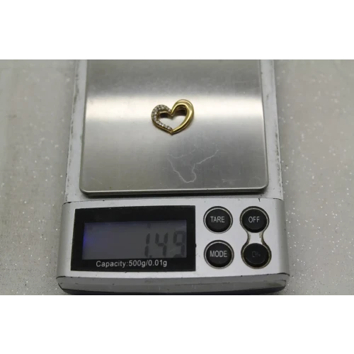 Signed 10k Y.G. .20ctw DIAMOND OPEN HEART DESIGN pendant