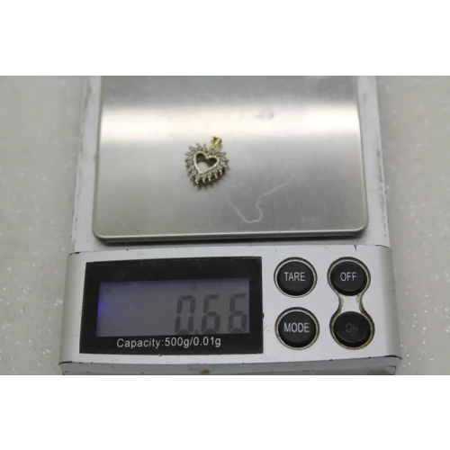 Signed 10k Y.G. DIAMOND OPEN HEART DESIGN pendant