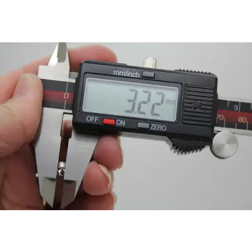 Signed 14k W.G. .16ctw Round Cut DIAMOND STUD earrings #